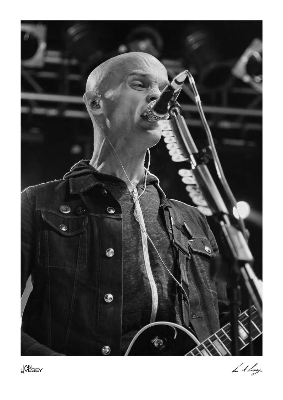 Zach Blair in rehearsals singing and playing guitar - Limited Edition